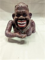 Cast iron smilin Sasquatch mechanical bank bigfoot