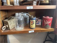 BOTTOM SHELF IN CABINET- WOOD PULLEY,GLASS JAR,TIN