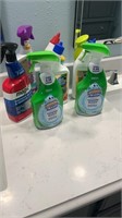 Eight bottles of full cleaning supplies