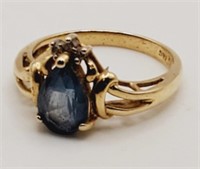 (A) 14Kt Yellow Gold Blue Topaz and Diamond Ring