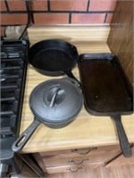 Cast-iron grill, skillet and saucepan. Saucepan
