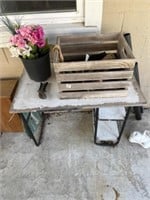 Table, wooden crate, planter, misc lights