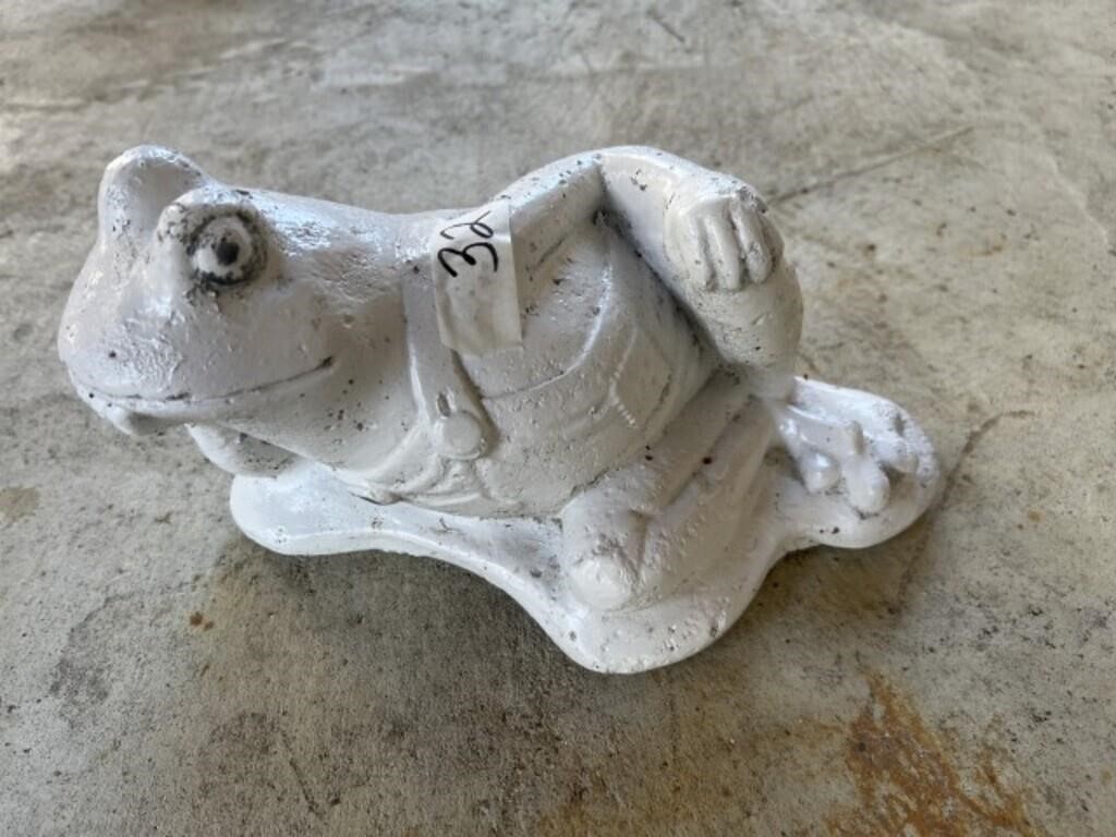 Concrete frog statue