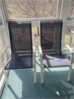 Two matching patio chairs