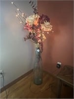 Large glass vase with fake flowers w/ lights