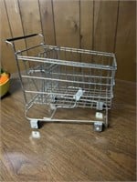 Miniature shopping cart on working wheels