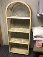 Wicker standing shelving unit with 3 wicker