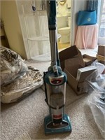 Shark Duo Clean vacuum cleaner in teal