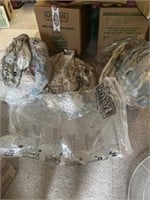 Comforters/ linens in vacuum sealed bags with one