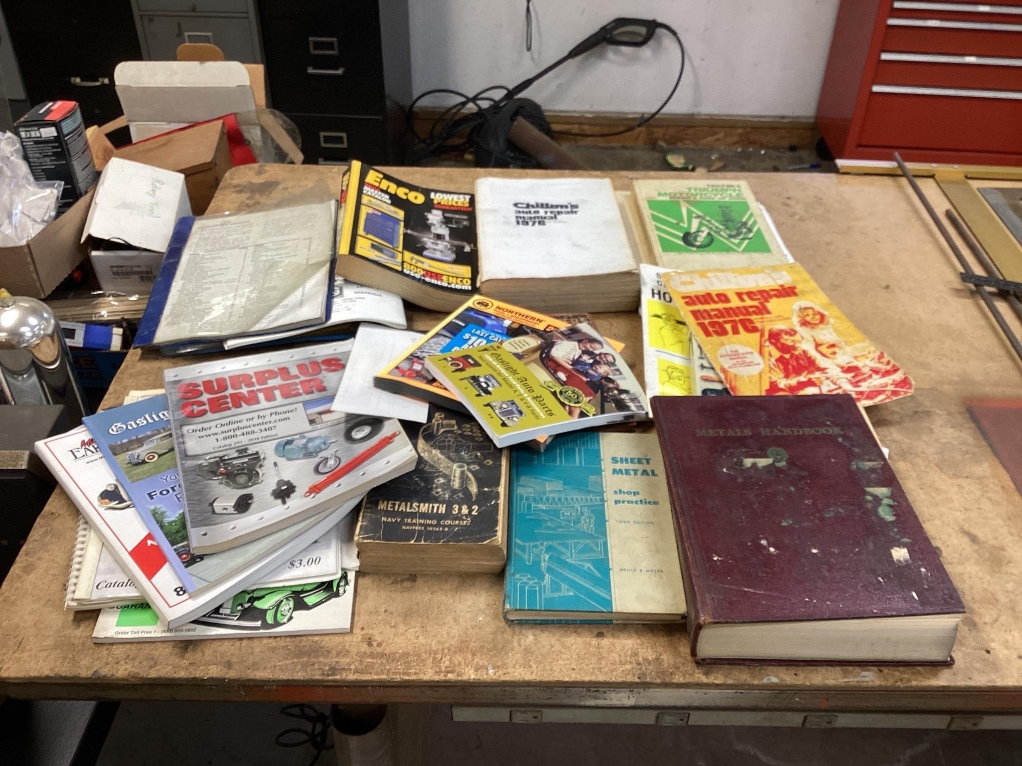 Assorted manuals, and Car books
