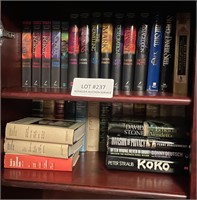Group of books in cabinet