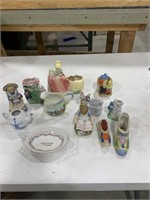 Assorted figurines, tea pots