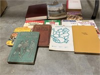 Assorted books,  cookbooks, clipboard