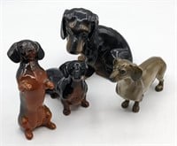 Lot Of Four Mixed Porcelain Dachshund Figurine