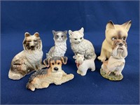 (7) Resin and Ceramic dog and cat figurines, and