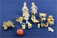Assorted figurines including Made in Occupied