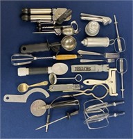 Assorted kitchen items including a can opener,