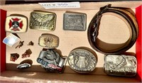 Flat of belt buckles, pins, leather belt
