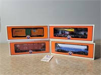 4 Lionel cars in Orig boxes