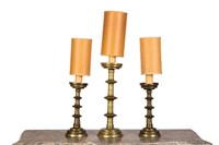 THREE ANTIQUE BRASS CANDLESTICKS AS TABLE LAMPS