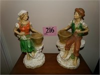 LARGE MAN AND LADY FIGURINES