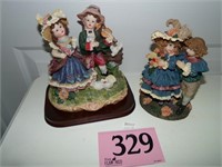 2 BOY AND GIRL FIGURINES