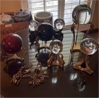 Assorted bronze and brass glass orb holders (7)