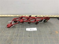 Red 4-bottom plow