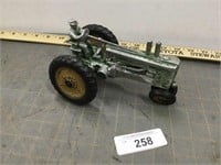 Vintage JD NF tractor with man