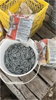 Pallet of Fencing Supplies: Pail of staples,