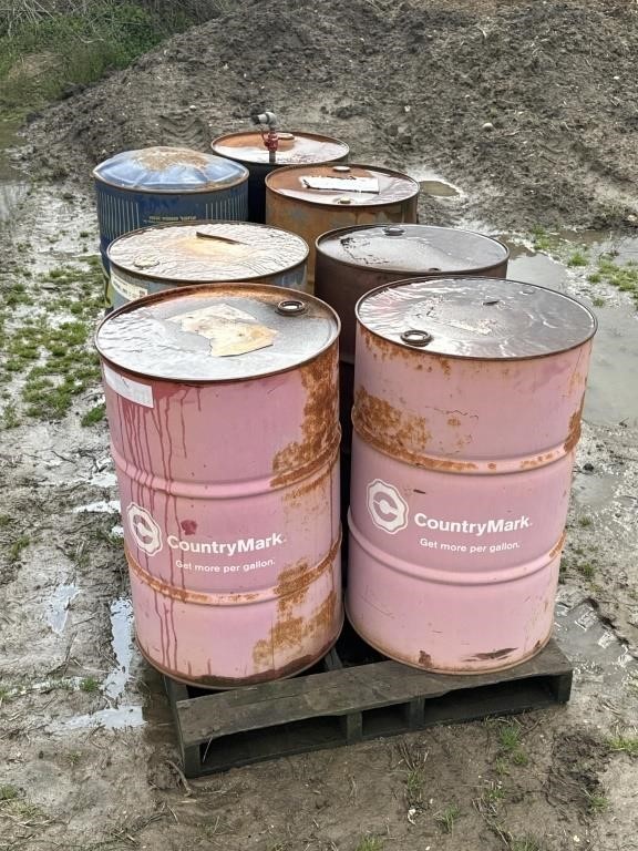 (7) METAL BARRELS