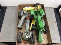 Assorted toy tractor parts