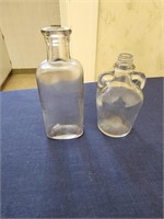 Small glass apothecary bottles