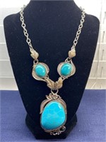 Silver tone blue stone necklace with magnetic