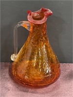 Orange crackle glass small pitcher handblown