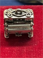 Sterling silver piano charm opens to expose keys