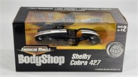AMERICAN MUSCLE 1/18 BODY SHOP SHELBY COBRA