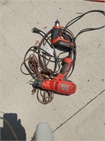 Two corded drills and two extension cords. Both
