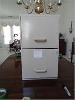 A two-door metal filing cabinet 
18x
24.5
x14