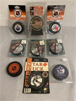 9 NHL Collector Hockey Pucks