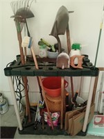 A shelf for garden tools and supplies