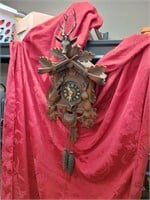 cuckoo clock with deer and antlers