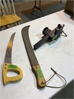 Quick vice, machete and hand saw