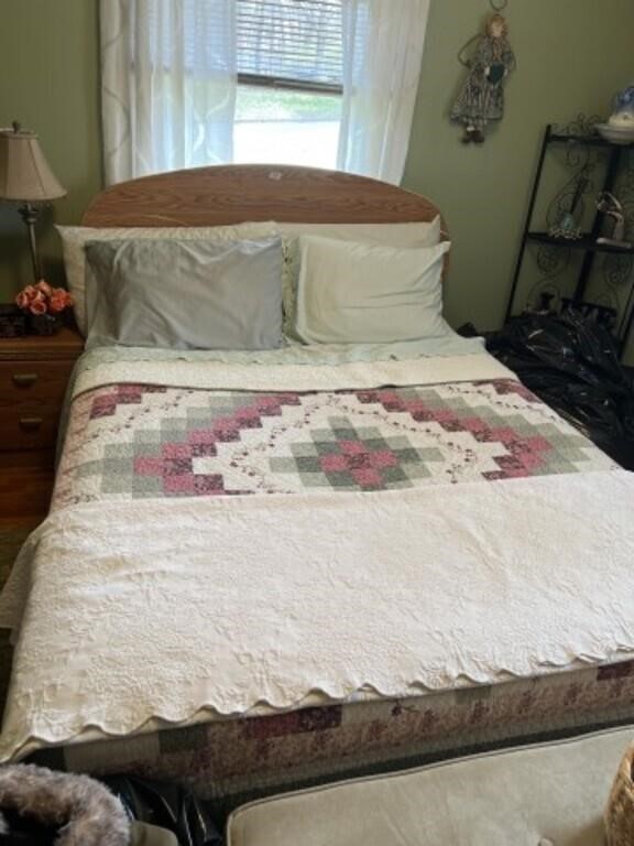 Bed with frame and linens