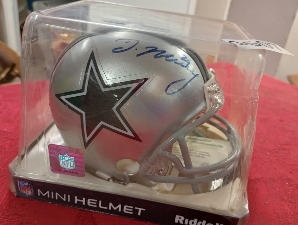signed cowboys mini helmet has coa