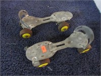 PAIR-- VINTAGE STEEL ROLLER SKATES