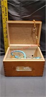 Recipie box with costume jewelry.