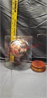 Barbie hanging globe. Stand has rust on top. See
