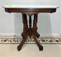 28x18 marble top parlor table w/fancy carved legs
