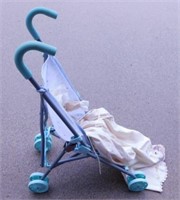 Baby doll 4 wheel folding stroller, 9" x 17" x